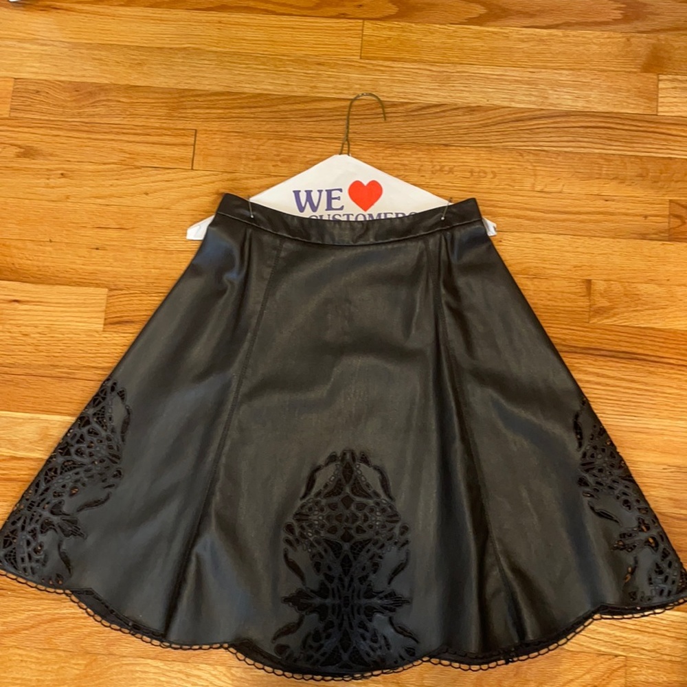 Tart black skirt beautiful cut out designs